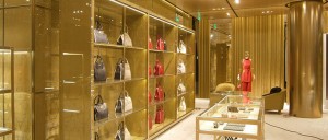 Interior of Miu Miu flagship store in Bejing. - Panels and merchanising units are finished in PVD coating Champagne SS04 No 4 brushed. - Architect: Roberto Bachiocci