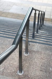 Canada Square, Canary Wharf, London. Handrail and balustrade in Double Stone Steel PVD colored stainless steel Gunmetal Brush