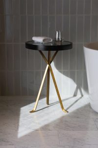 Furniture for hotel bathroom side-table legs in Double Stone Steel PVD colored stainless steel Champagne Brush.