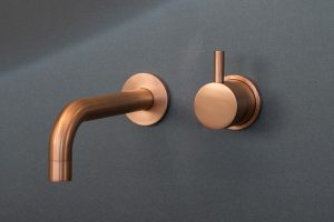 Panel-mounted manual tap DV 1675 in Double Stone Steel PVD colored stainless steel Copper Brush