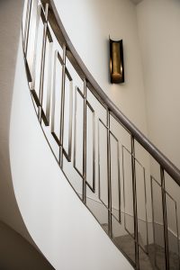 Private residential property upgrade, limed oak handrail with balustrade in Double Stone Steel PVD colored stainless steel Almond Gold Brush