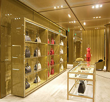 Miu Miu flagship store in Bejing with panels and merchandising units finished in Double Stone Steel PVD coating Champagne SS04 No 4 brushed