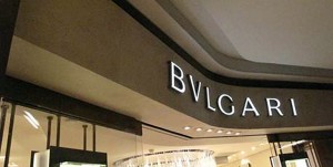 Bulgari, Macau - Store façade in Double Stone Steel PVD coating Chrome SS003 SB to sign lettering and Antique Brass SS021 to fascia