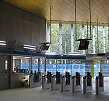 Wood Lane underground, London, ticket hall with gold anodised aluminium ceiling. Wood Lane underground, London, ticket hall with gold anodised aluminium ceiling.