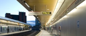 Gold anodised aluminium ceiling in Wood Lane tube station, Westfield, London UK - Fabricated and installed by John Desmond Ltd, UK and Europe partner to Double Stone Steel