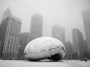 The stainless steel surface of Anish Kapoor’s Cloud Gate sculpture covered in ice in freezing Chicago temperatures.