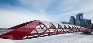 View of The Peace Bridge, Calgary from bank to bank of the Bow River