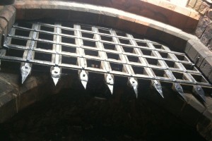 Portcullis at Carlisle Castle, Cumbria. - Photograph by Dancing Beastie.