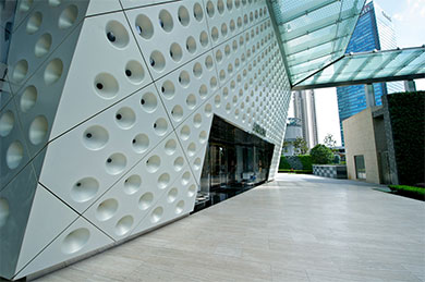 Gleaming, white-coated aluminium cladding to store front of Prada, Shanghai. Gleaming, white-coated aluminium cladding to store front of Prada, Shanghai.