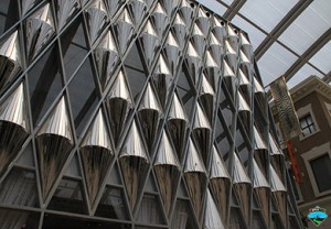 Façade of the Roberto Cavalli Caffé, The Avenues, Kuwait. Fabricated by Double Stone Steel from 2mm 316 grade stainless steel and hand-polished to a super 8 finish.