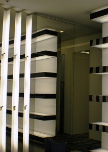 Shelf-edges fabricated from PVD coloured stainless steel in Black is Black, for Christian Dior store, Macau.