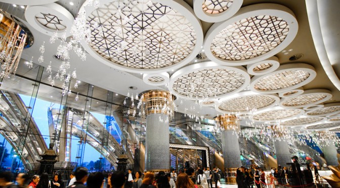 The foyer of the Grand Lisboa Casino showing decorative ceiling created using PVD coloured stainless steel in Vegas Gold by Double Stone Steel - Photography: Adam Nowek - Developer : Societe Jorges de Macau - Architects: DLN Architects & Engineers - Structural Engineer: Design Maunsell Consultants Asia Ltd. - MEP Engineer Design: Parsons Brinckerhoff Consultants Private Limited - Main Contractor: Hip Hing Construction