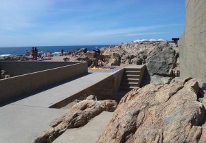 The blend of concrete with rocks at the Swimming pool by Alvaro Siza, Leça da Palmeira, Portugal.