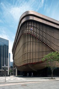 PVD stainless steel in Rose Gold Vibration is used for the spectacular moving veil created from tubes, Shanghai Bund Arts and Cultural Centre. - Architects: Foster & Partners; Heatherwick Studio - PVD: Double Stone Steel in partnership with John Desmond Ltd