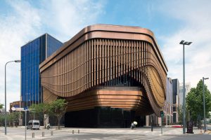 The dramatic and imaginative architecture of the Shanghai Bund Arts and Cultural Centre with its façade made from PVD stainless steel in Rose Gold Vibration. Architects: Foster & Partners; Heatherwick Studio - PVD: Double Stone Steel in partnership with John Desmond Ltd