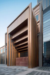 PVD stainless steel in Rose Gold Vibration was specified for door entries to create a sumptuous effect. Shanghai Bund Financial Centre. - Architects: Foster & Partners; Heatherwick Studio - PVD: Double Stone Steel in partnership with John Desmond Ltd