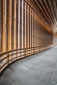 The interior walkway looking from the inside at the façade of the Shanghai Bund Arts and Cultural Centre. Façade fabricated from PVD stainless steel in Rose Gold Vibration. - Architects: Foster & Partners; Heatherwick Studio - PVD: Double Stone Steel in partnership with John Desmond Ltd