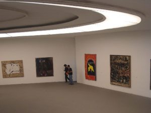 Circular, sweeping interior rooflight. Oscar Niemeyer’s Museu de Arte Contemporânea de Niterói, Brazil. Photography by Lola Adeokun