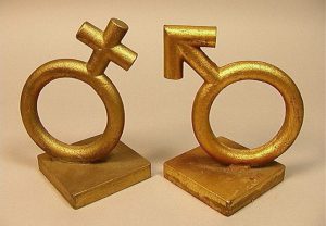 Curtis Jere Bookends Male and Female. Iron with gilt paint