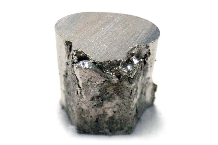 A piece of the chemical element nickel (Ni). Nickel is resistant to