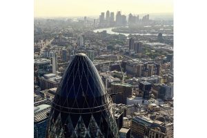 View from the top of 22 Bishopsgate facing East on a sunny morning with the top of the Gherkin right in front of us a few meters below. At the back we can observe the Canary Wharf skyline in competition with the changing skyline of the City of London. Photograph by Antonio Moll.