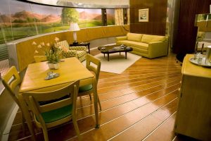 The interior of the Dymaxion House designed by Richard Buckminster-Fuller on display at the Henry Ford Museum in Michigan. The lounge contained a 33ft long window. Image from the Collections of The Henry Ford Museum.