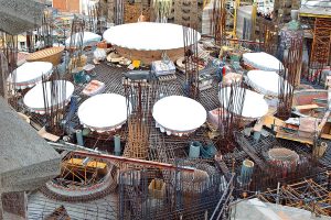 The roof of the Sagrada Familia Basilica in Barcelona under construction. Concrete reinforced with steel bars is the method being used to erect this famous building. Photograph by Etan J. Tal.