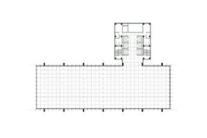 Floor plan of The Inland Steel Tower showing the location of the service tower behind the office tower and the supporting 14 exterior columns that free up the floor space completely on each level