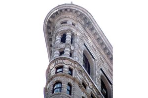 Close-up view of the Flatiron building ‘prow’ showing its Renaissance style facades with ornate Greek columns - these were made in prefab terracotta elements that were fixed onto the steel curtain wall structure (211 cars)