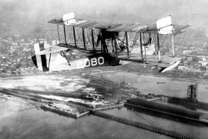 A HS-2L Flying Boat in the air over Florida in the 1920s. The aircraft was designed and built by the Curtiss Aeroplane Company using duralumin, a lightweight aluminium alloy. Image from U.S. Navy National Museum of Naval Aviation.